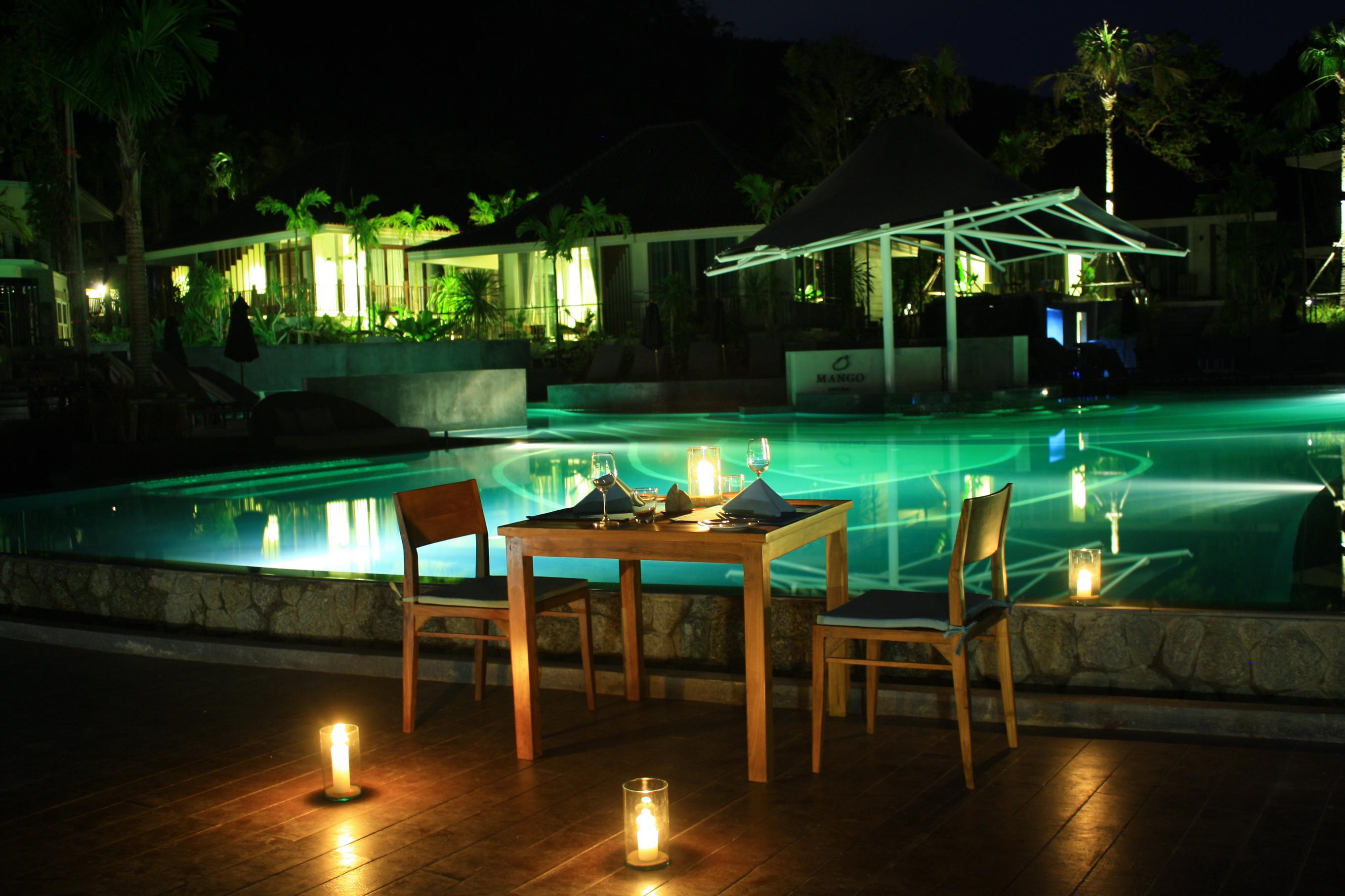 Mandarava Resort And Spa, Karon Beach Exterior photo The swimming pool at night